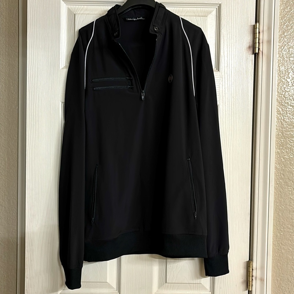 Black 3/4 zip men’s light weight Travis Matthew jacket